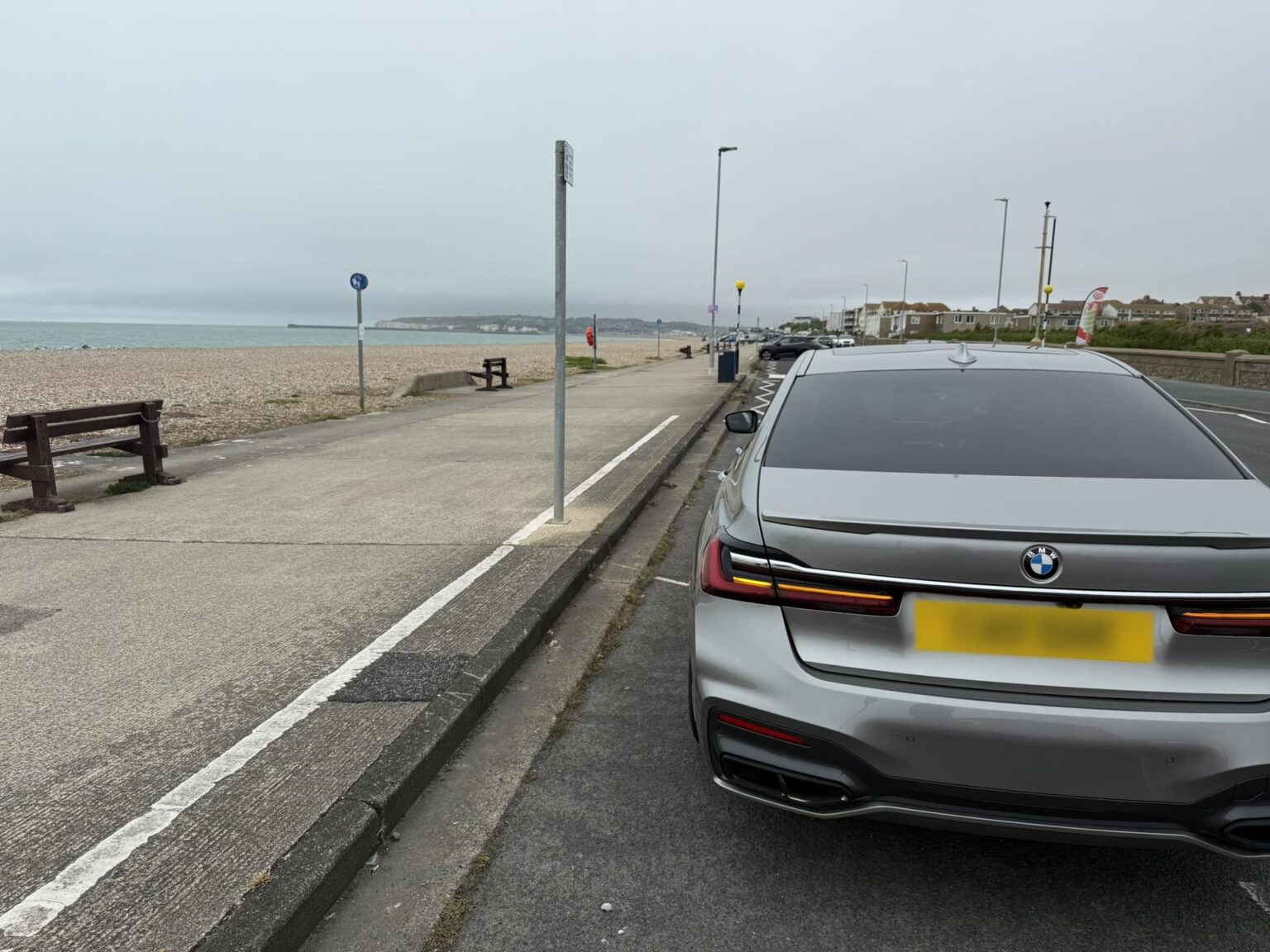 BMW 7 Series chauffeur car parked on the seafront